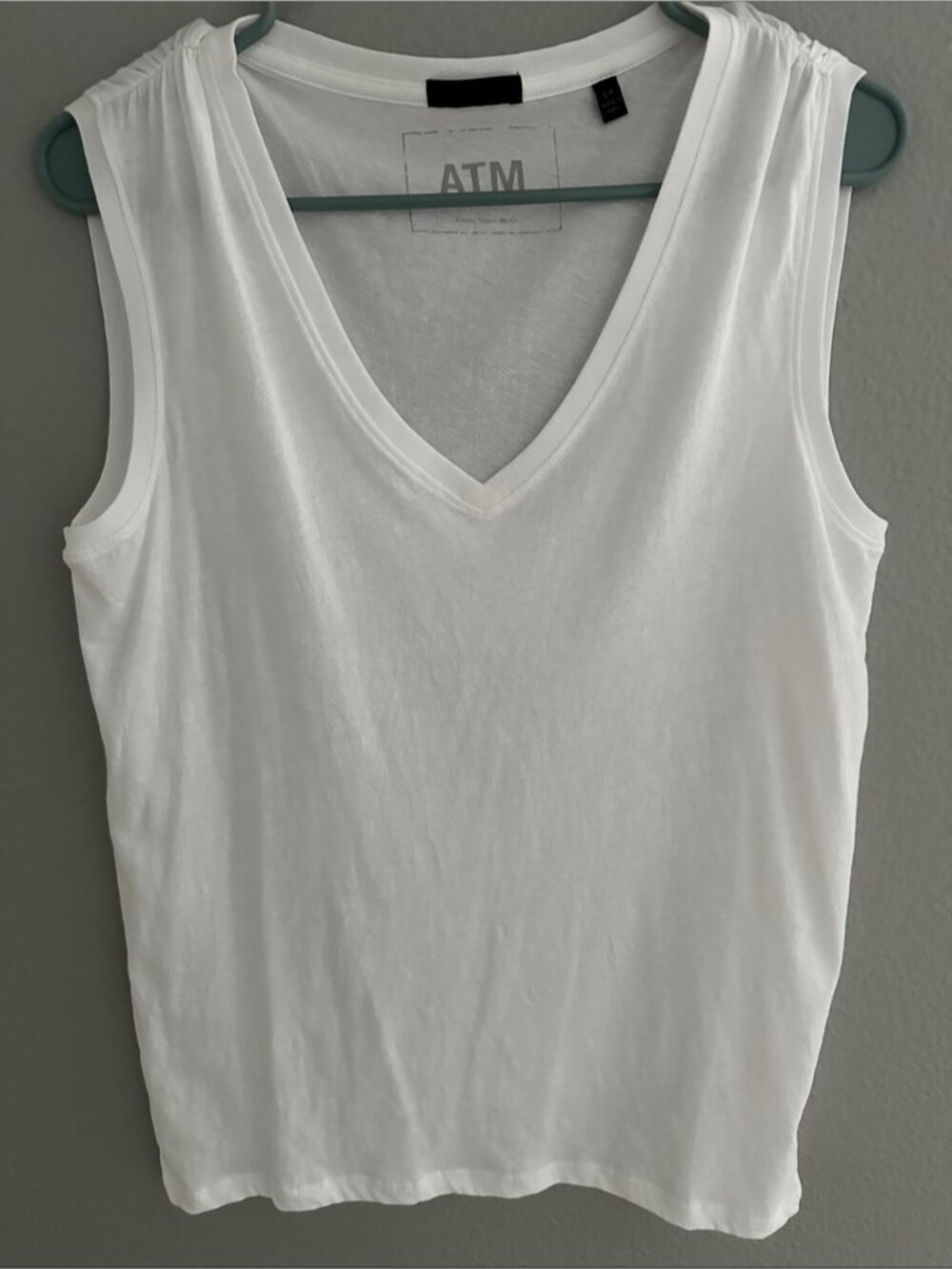 White shortsleeved top